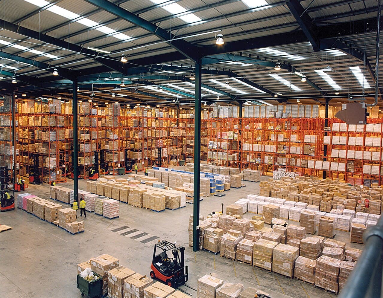 Warehouse with pallet racking and forklift